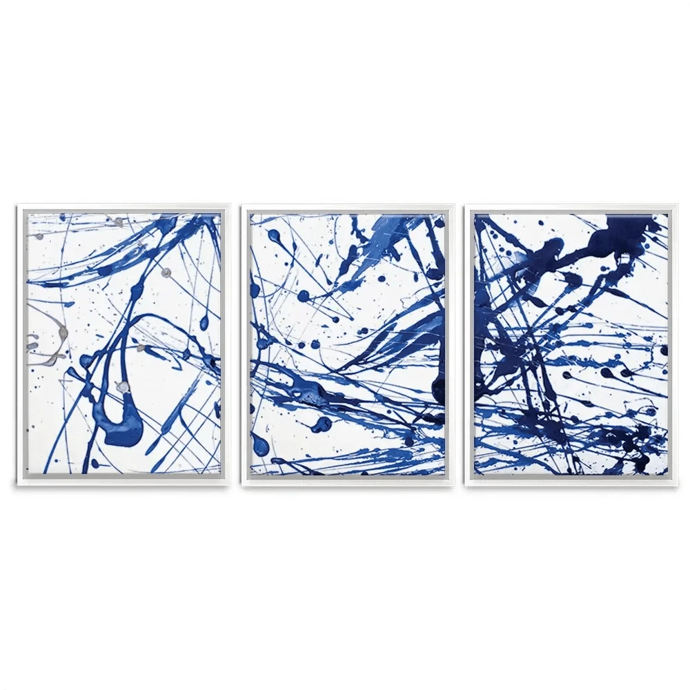 Blue Paint Spatter Trio Canvas Print Blue Paint Spatter Trio Canvas Print wall art product Nataliya Sdobnikova / Shutterstock