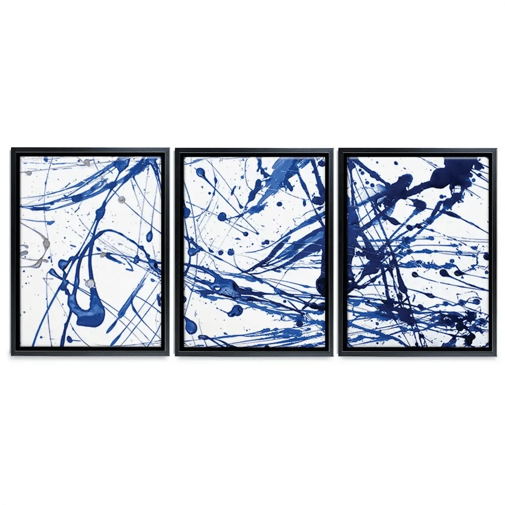 Blue Paint Spatter Trio Canvas Print Blue Paint Spatter Trio Canvas Print wall art product Nataliya Sdobnikova / Shutterstock
