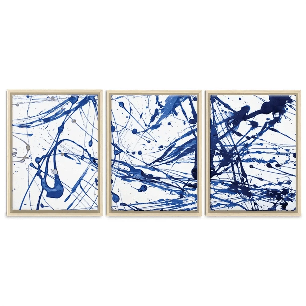 Blue Paint Spatter Trio Canvas Print Blue Paint Spatter Trio Canvas Print wall art product Nataliya Sdobnikova / Shutterstock