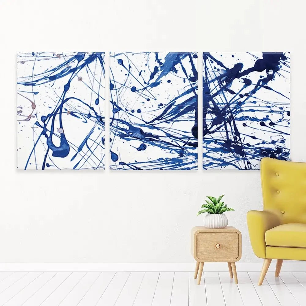 Blue Paint Spatter Trio Canvas Print Blue Paint Spatter Trio Canvas Print wall art product Nataliya Sdobnikova / Shutterstock