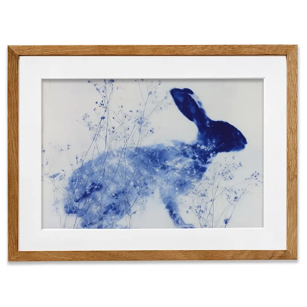Blue Rabbit Silhouette With Wildflowers Framed Art Print Blue Rabbit Silhouette With Wildflowers Framed Art Print wall art product Chromatic Storm Studio