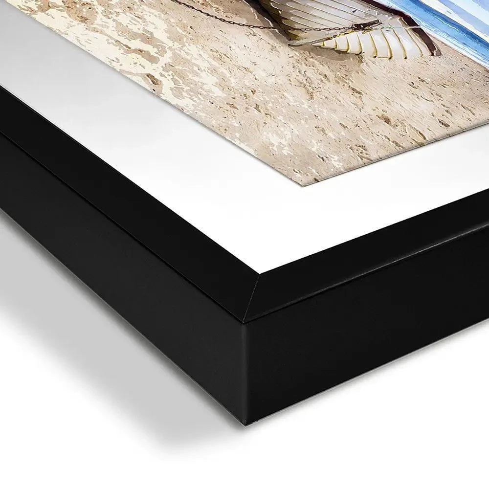 Fishing Boats Under A Brooding Sky Framed Art Print Fishing Boats Under A Brooding Sky Framed Art Print wall art product Helen Hotson / Shutterstock