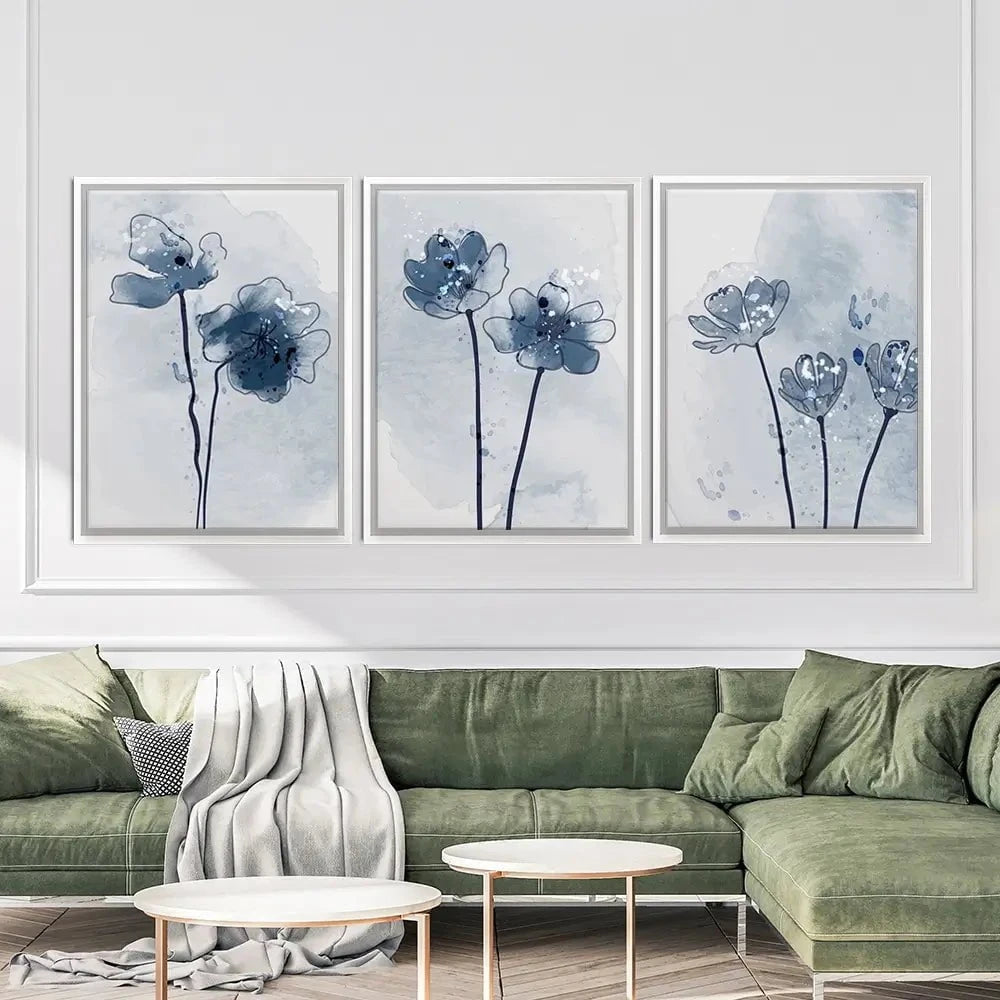 Pretty Blue Flowers Trio Canvas Print Pretty Blue Flowers Trio Canvas Print wall art product TWINS DESIGN STUDIO / Shutterstock