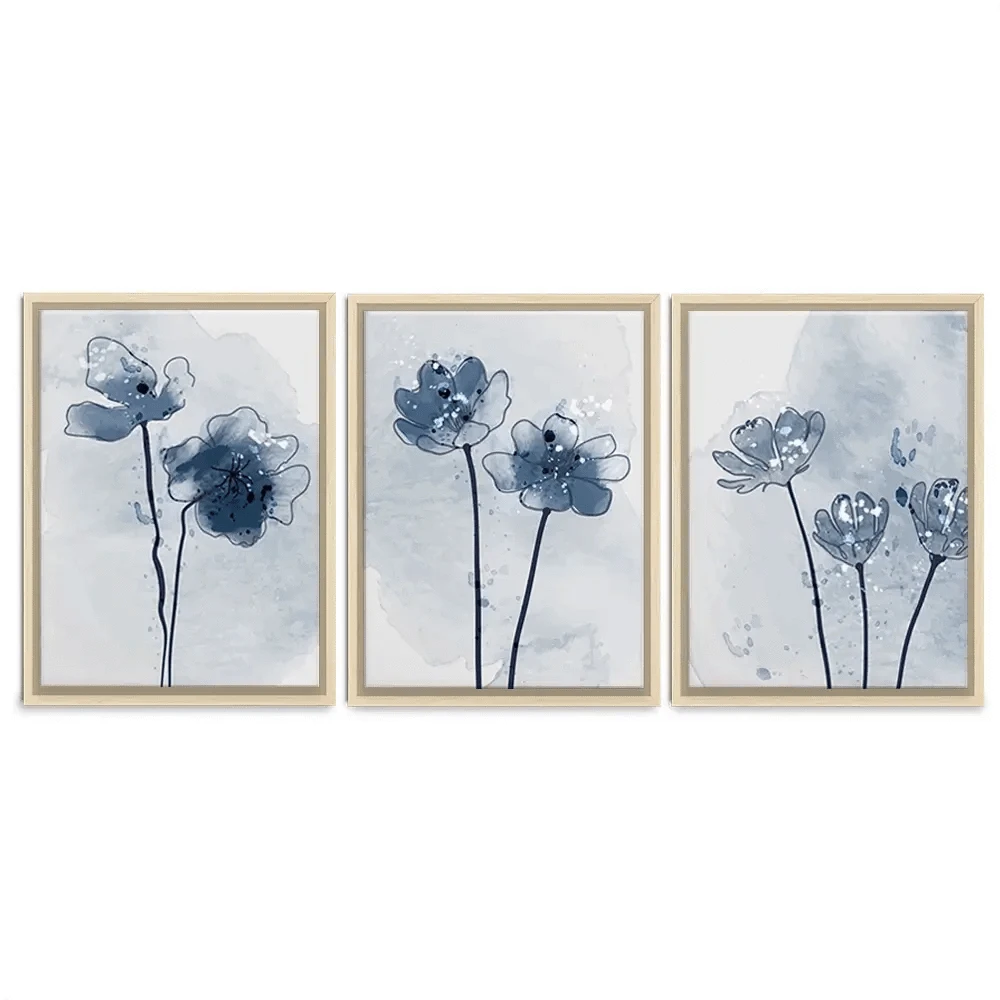 Pretty Blue Flowers Trio Canvas Print Pretty Blue Flowers Trio Canvas Print wall art product TWINS DESIGN STUDIO / Shutterstock