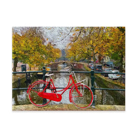 Red Bike In Amsterdam Canvas Print Red Bike In Amsterdam Canvas Print wall art product Wut_Moppie / Shutterstock